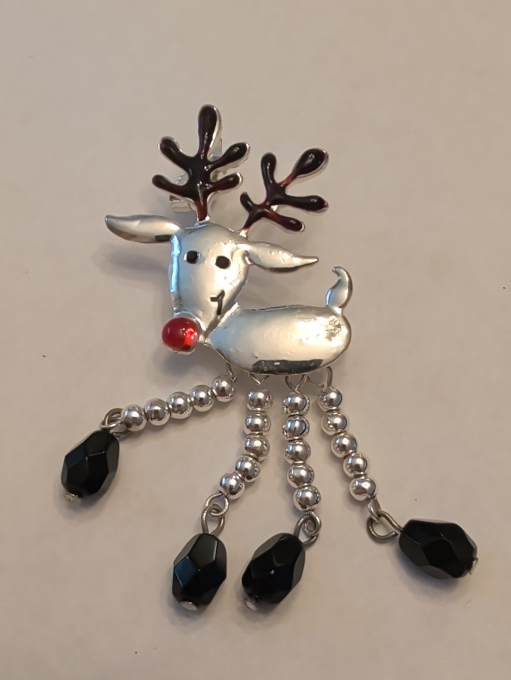 Festive Silver Reindeer Brooch with Red Nose and Black Beads